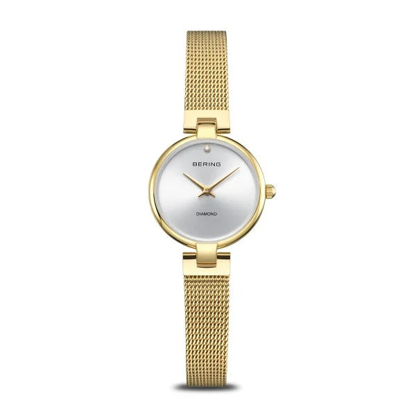 Orologio con cassa dorata, quadrante argentato e cinturino in maglia rolò dorata.