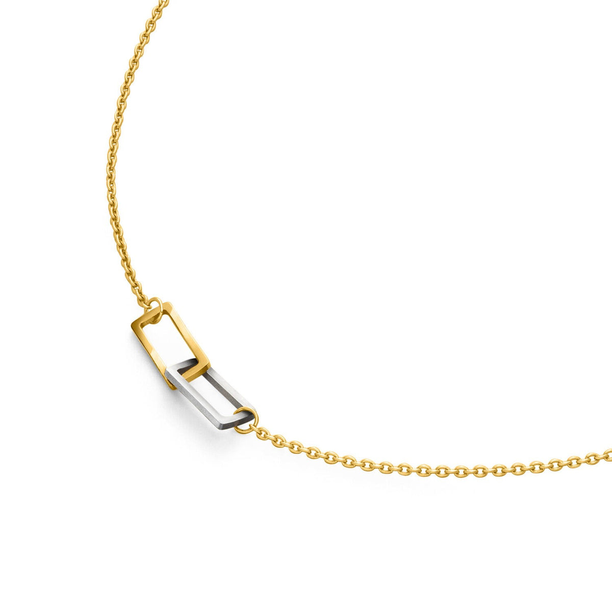 Collana in titanio con dettagli dorati e un elemento centrale argentato a forma di fibbia.