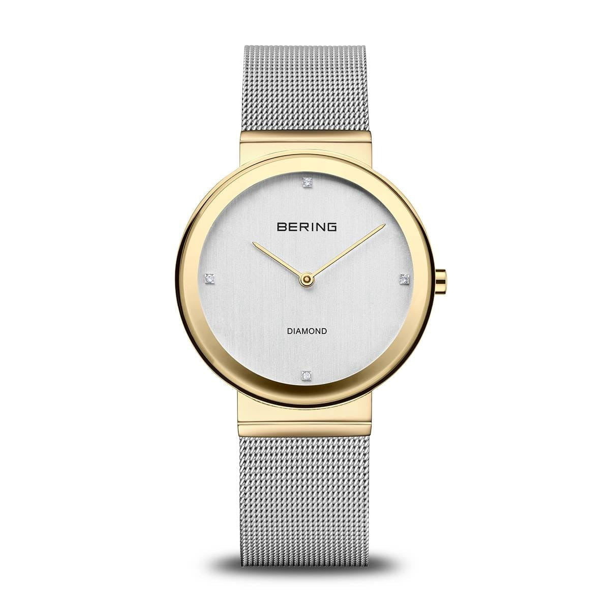 Orologio da donna Bering con cassa dorata e quadrante argentato, bracciale in maglia rolò argentata.