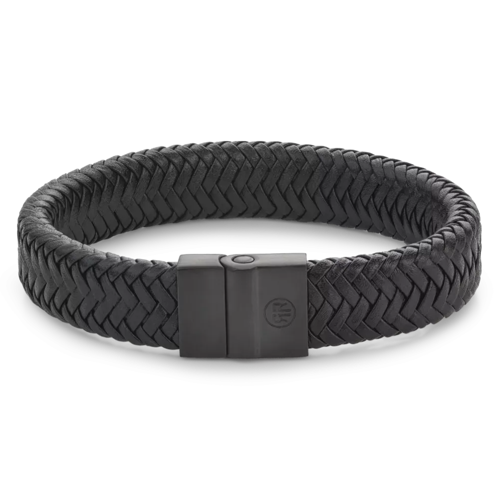 Bracciale in metallo nero con intreccio a zigzag e chiusura magnetica.
