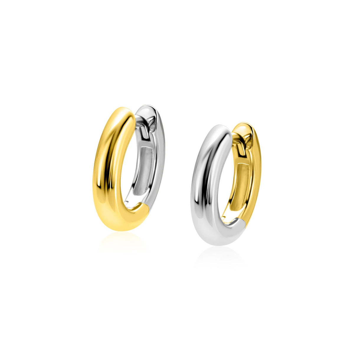 Orecchini in argento e oro, forma a cerchio, finitura lucida.