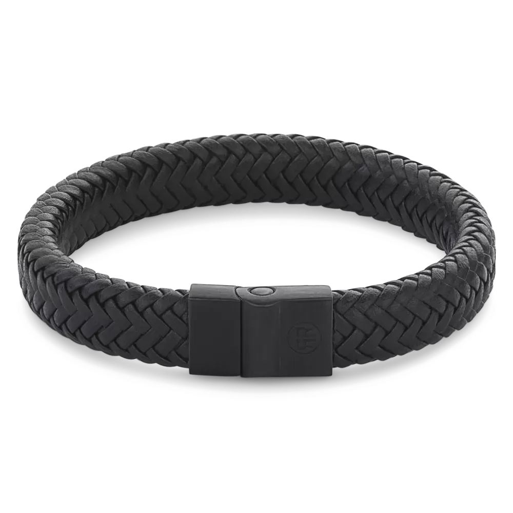 Bracciale in metallo nero con motivo a spina di pesce e chiusura magnetica.