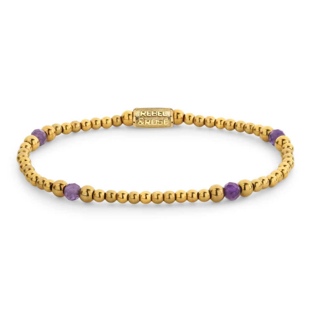 Bracciale in oro con perline dorate e pietre viola.