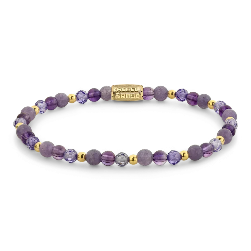 Bracciale con perle viola e dettagli dorati, composto da diverse sfere di ametista e cristallo.