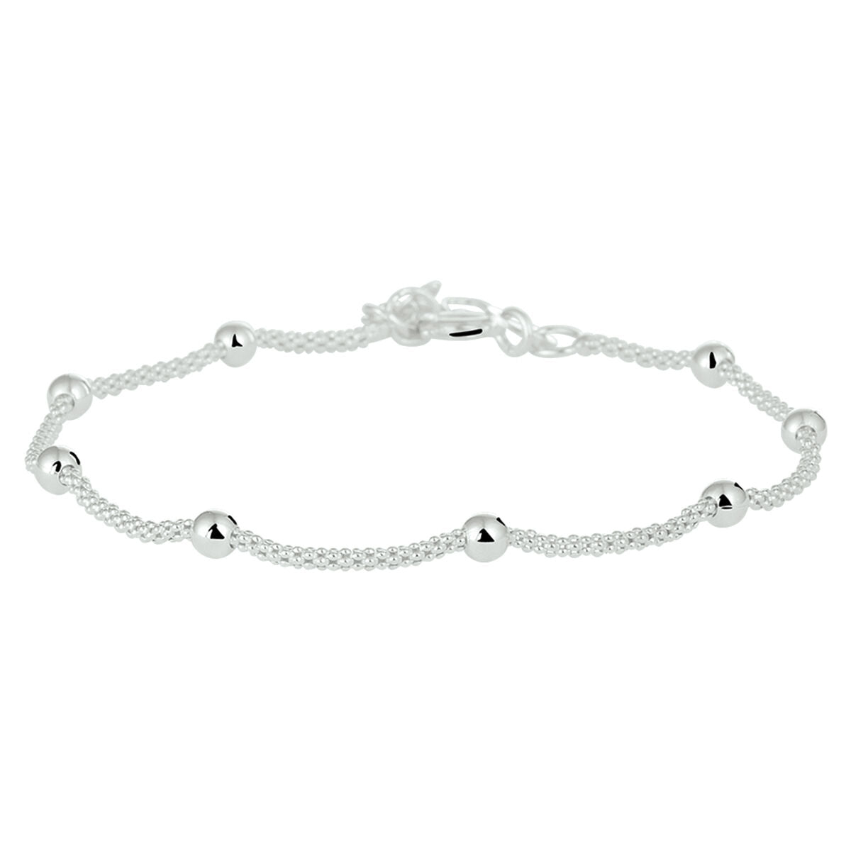 Bracciale argento con maglia a pallini.