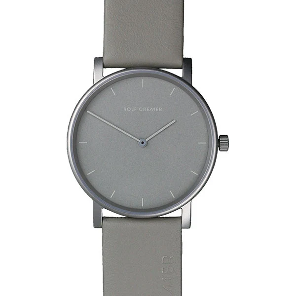 Orologio Rolf Cremer con cassa argentata e quadrante grigio, cinturino in pelle grigia.