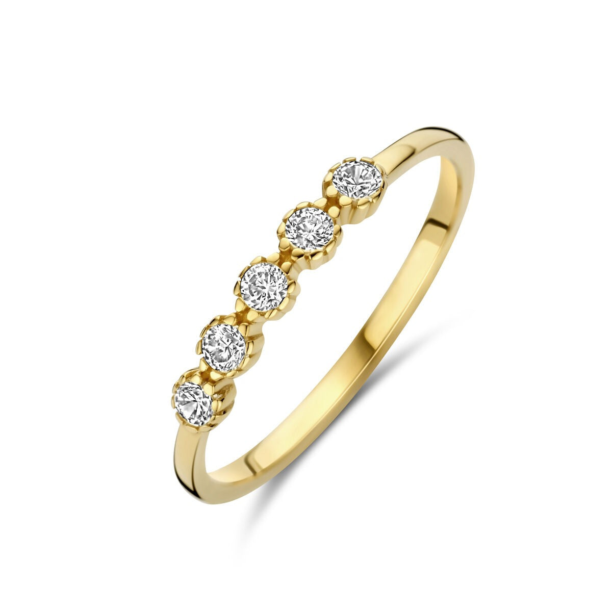 Anello in oro giallo 9k con cinque zirconi incastonati.