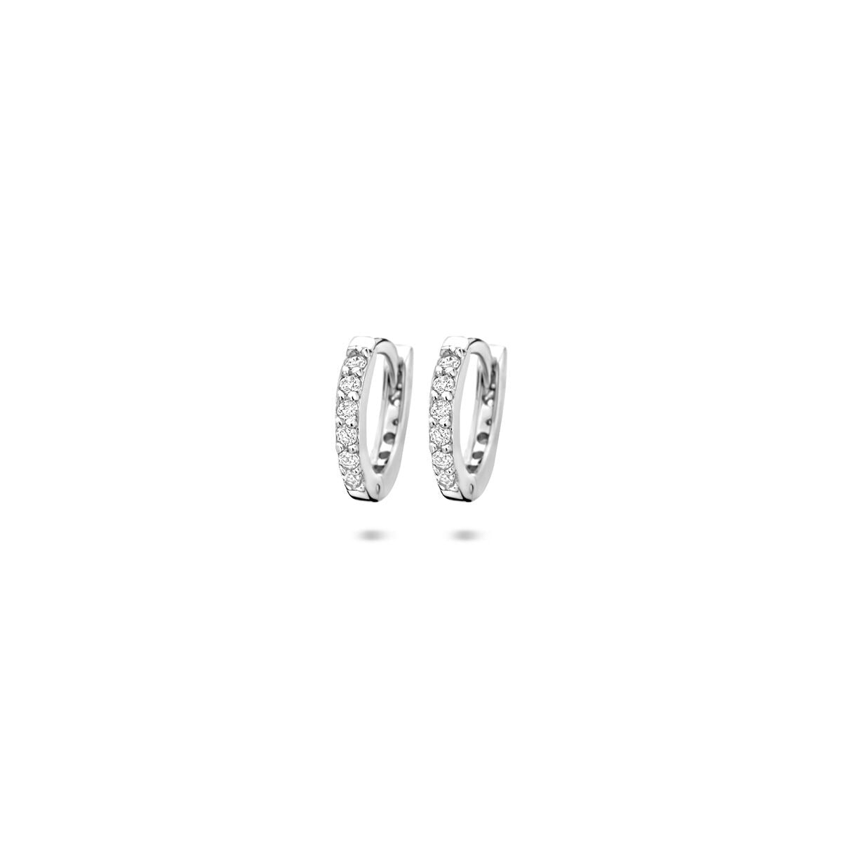 Orecchini alla creola in argento rodiato con zirconi.