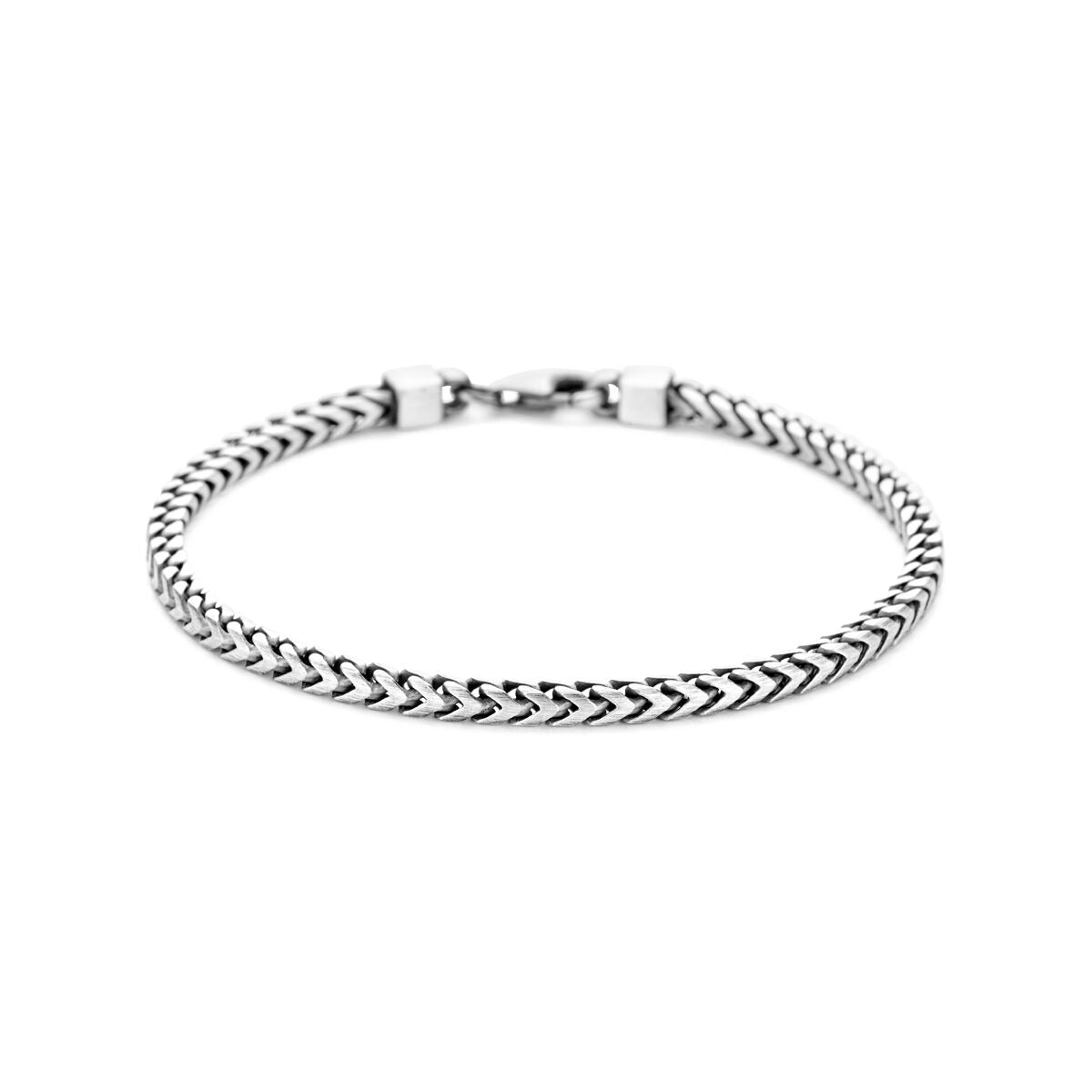 Geoxideerde zilveren heren armband met een fantasie schakel van 3 mm, met een gedetailleerd, gevlochten ontwerp.