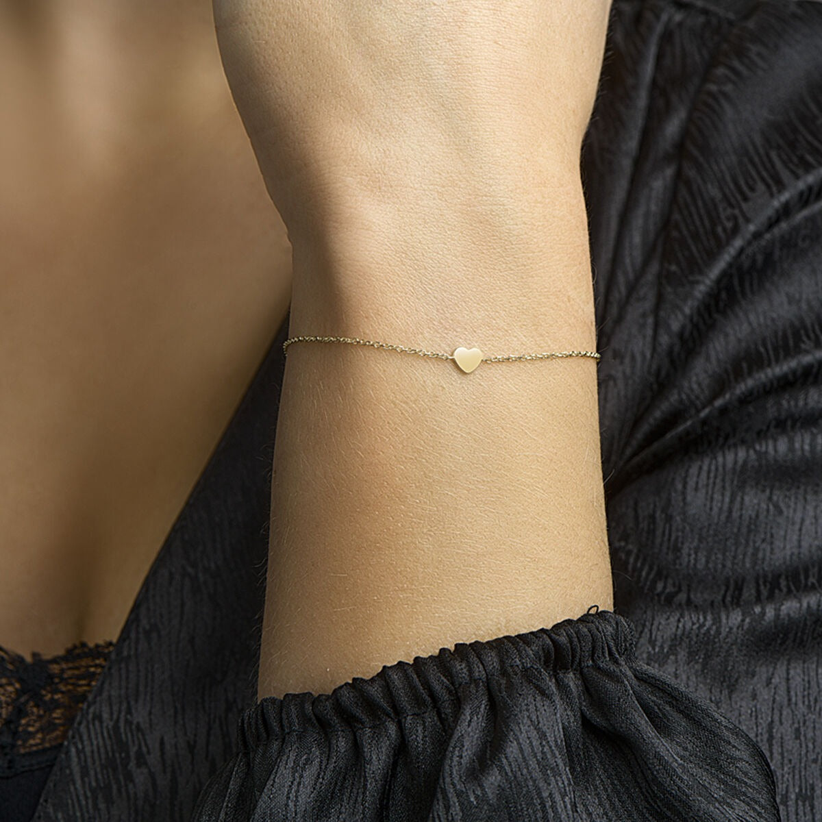Bracciale in oro giallo 14k con cuore