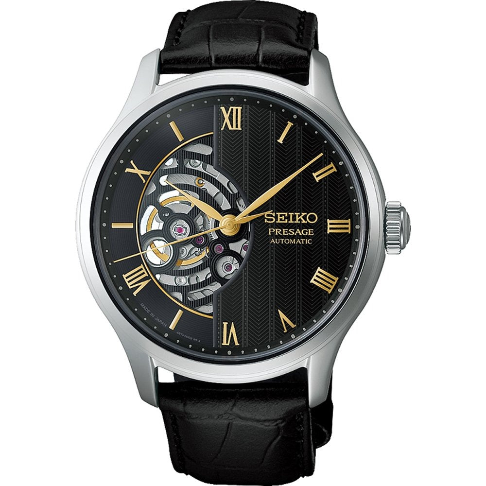 Orologio da uomo Seiko con quadrante nero, cassa argentata e cinturino in pelle nera.