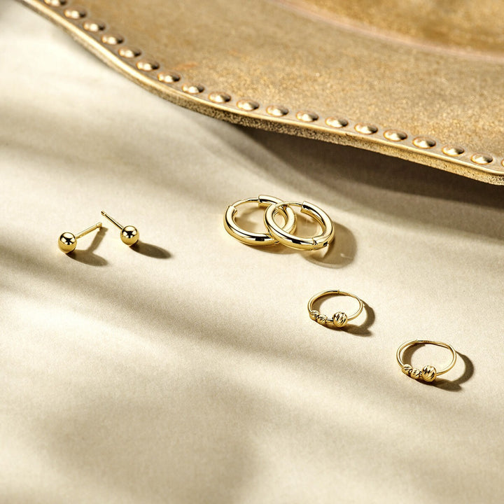 Gouden oorringen met bolletjes – 14k