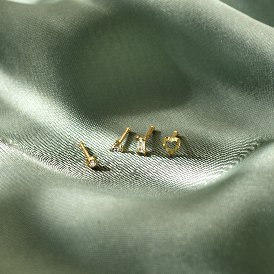 14k Geelgouden neusknopje met zirkonia in entourage zetting