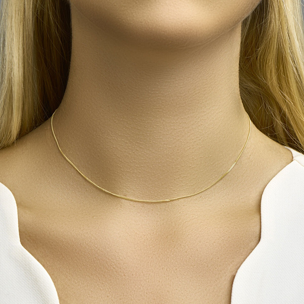 Collana in oro giallo 18k con maglia gourmette
