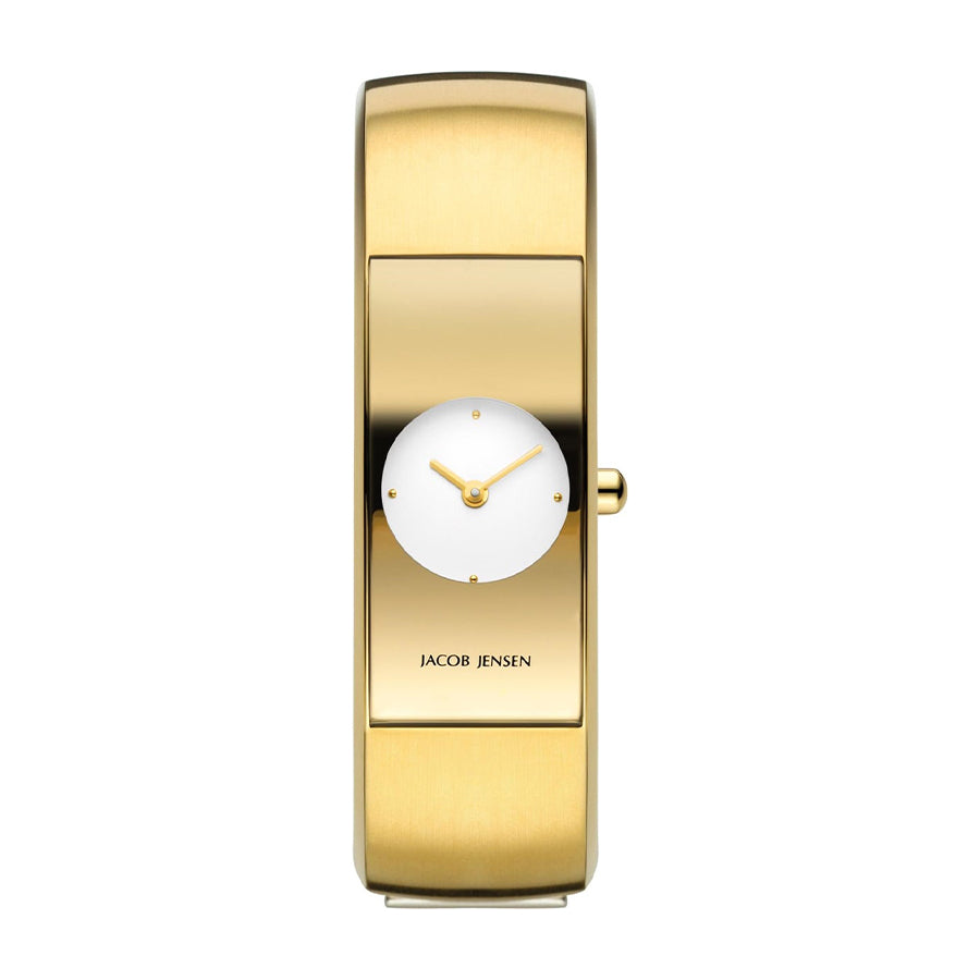 Orologio dorato con quadrante bianco e lancette, design minimalista e forma rettangolare.