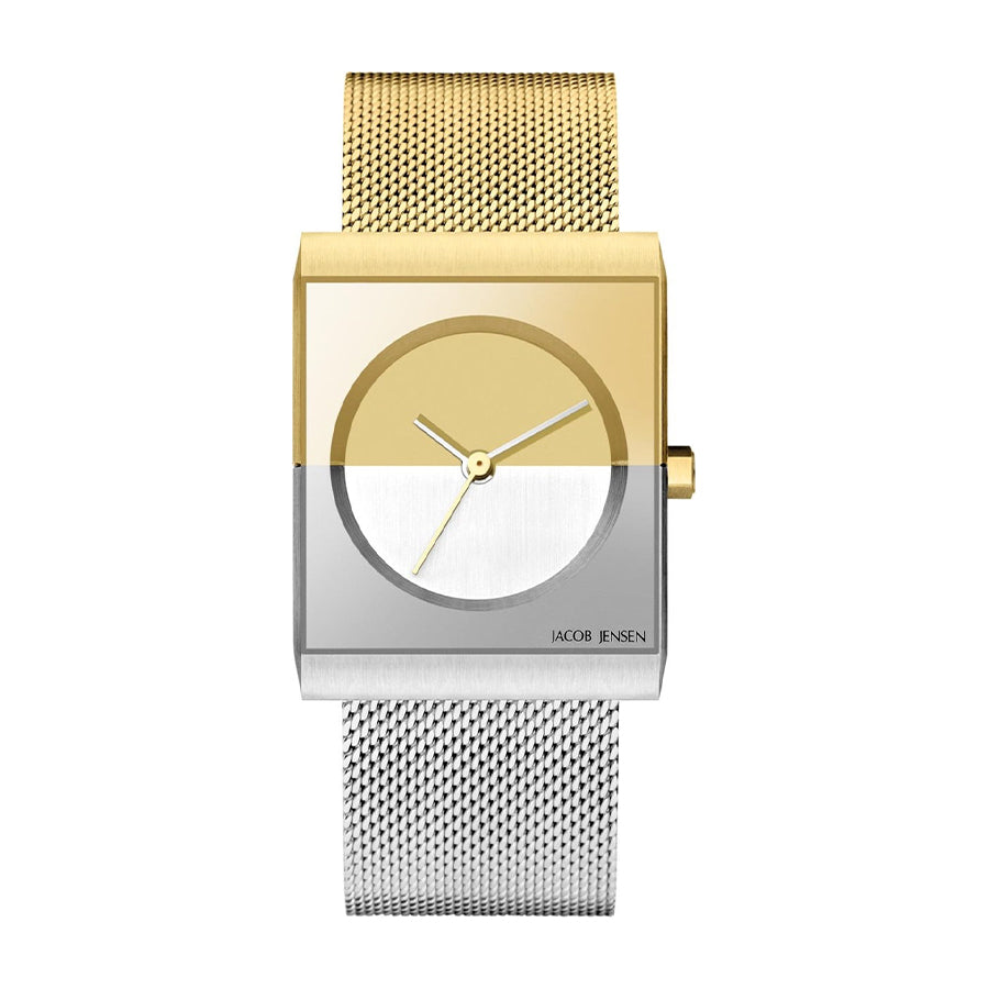 Orologio quadrato bicolore con cassa dorata e argentata, cinturino in maglia metallica.