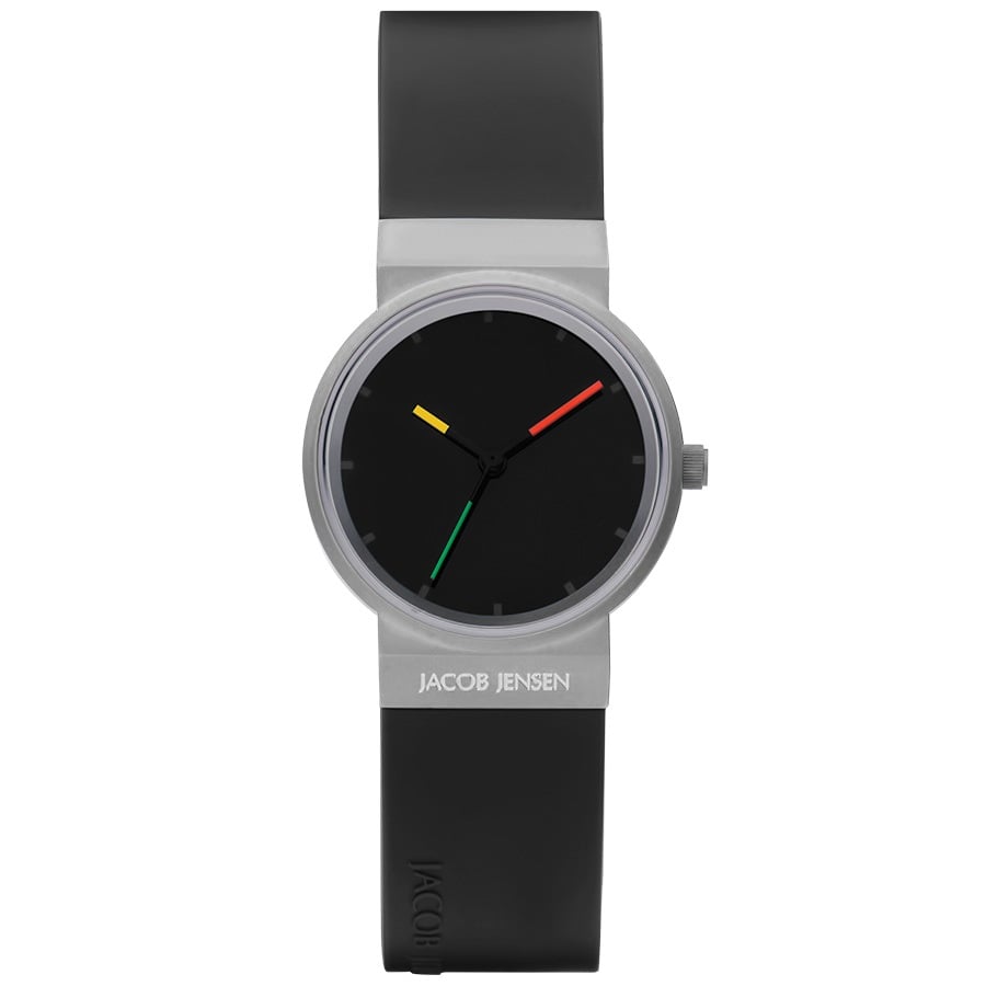 Orologio con cassa argentata, quadrante nero e cinturino in silicone nero, lancette colorate.