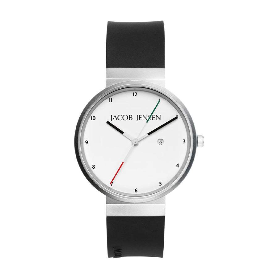 Orologio con cassa in acciaio inox, quadrante bianco, cinturino in silicone nero e lancette colorate.