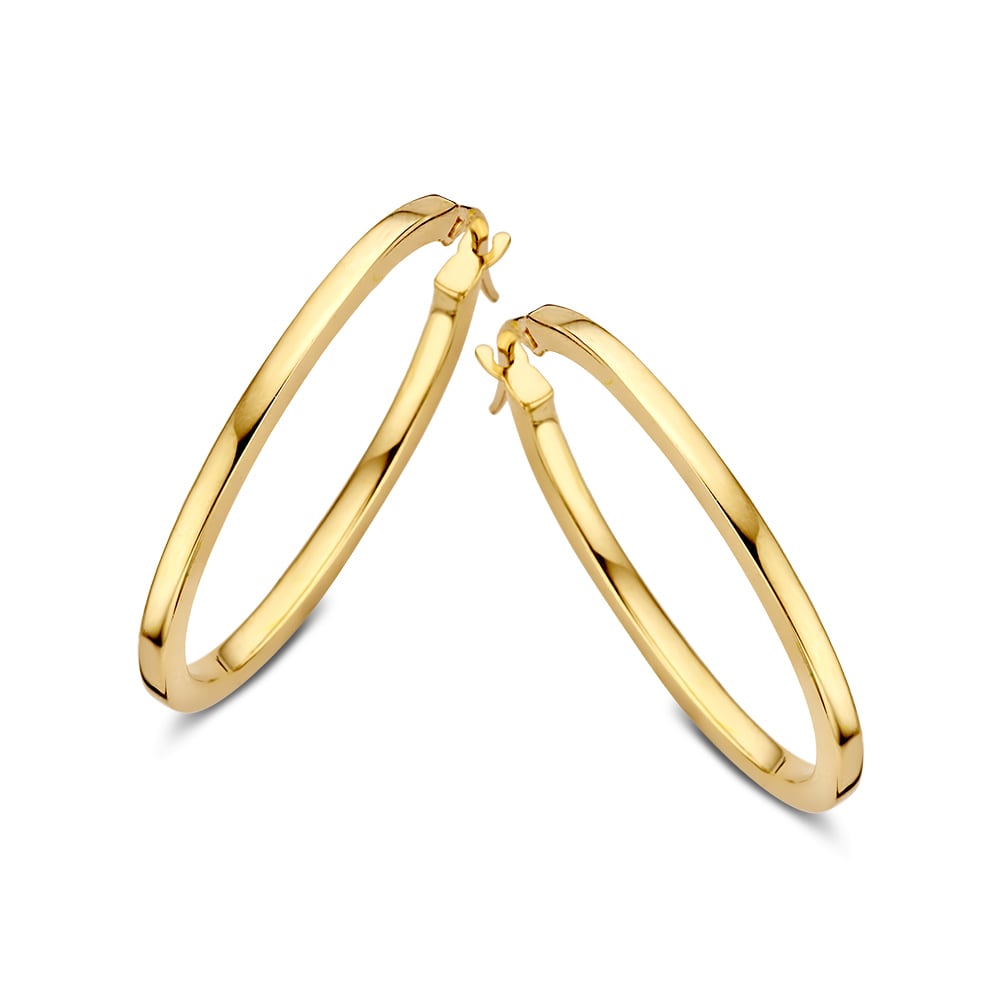 Orecchini alla creola in oro giallo 14 carati, design minimalista ed elegante, misura interna 16 x 25 mm.