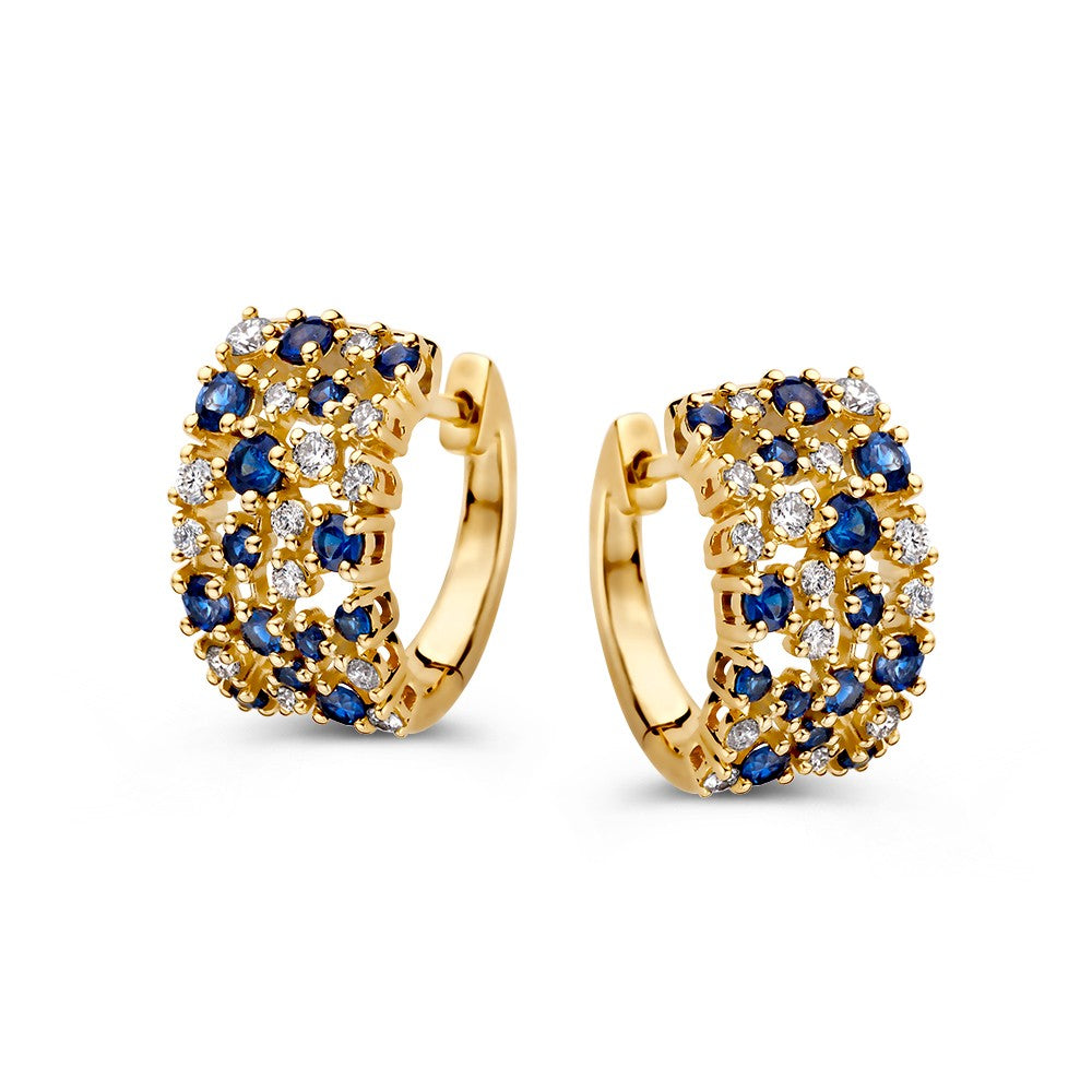 Orecchini alla creola in oro giallo con zaffiri blu e diamanti.