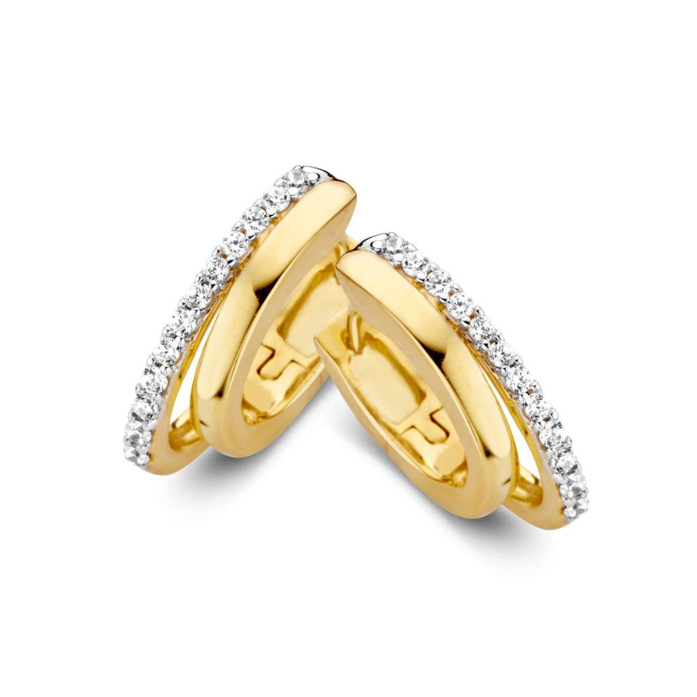 Orecchini in oro 14 carati con bande asimmetriche e zircone.