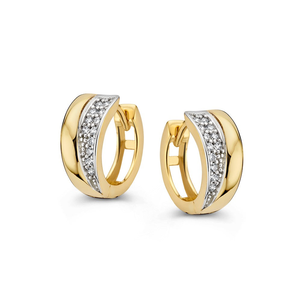 Orecchini alla creola in oro giallo con zircone in pavé.