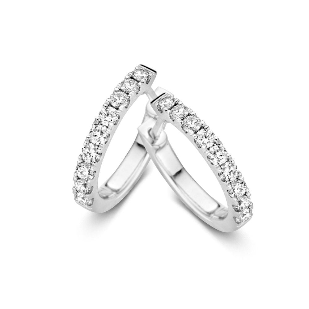 Orecchini in oro bianco con 16 diamanti brillanti, 14 carati, 0,48 crt.
