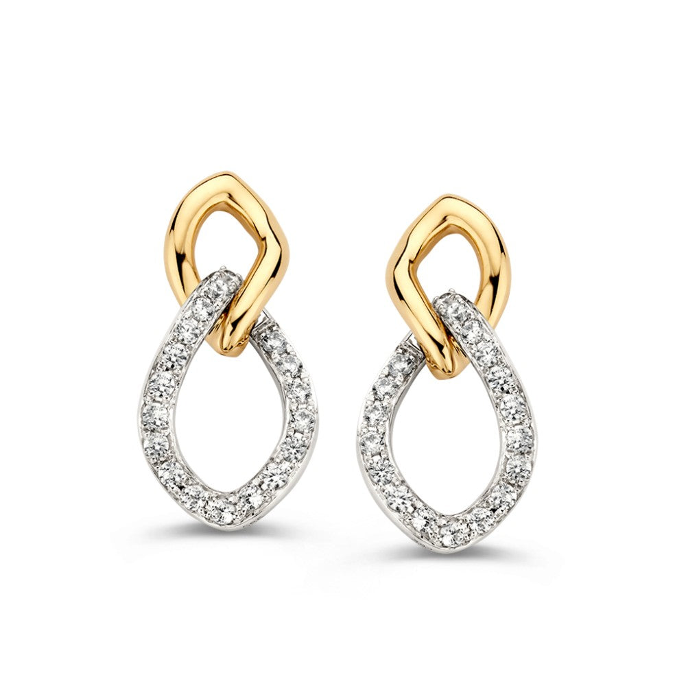 Orecchini bicolore in oro bianco e giallo con zirconi, a forma di goccia.