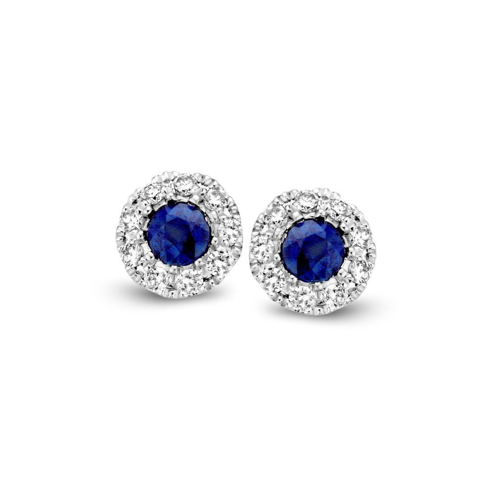 Orecchini bicolori in oro con zaffiro e diamanti, incastonati in un design rotondo.