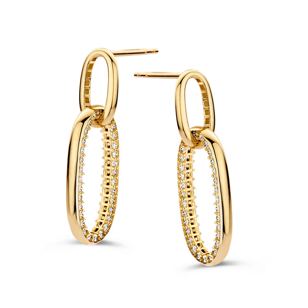 Orecchini in oro giallo con ovali intrecciati e zirconi, design giocoso e luminoso.