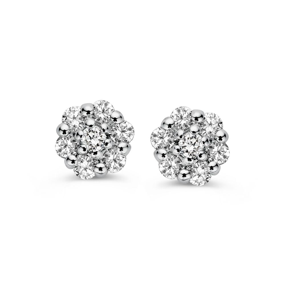 Orecchini in oro bianco con diamanti in incastonatura entourage, 0,16 ct di brillante.