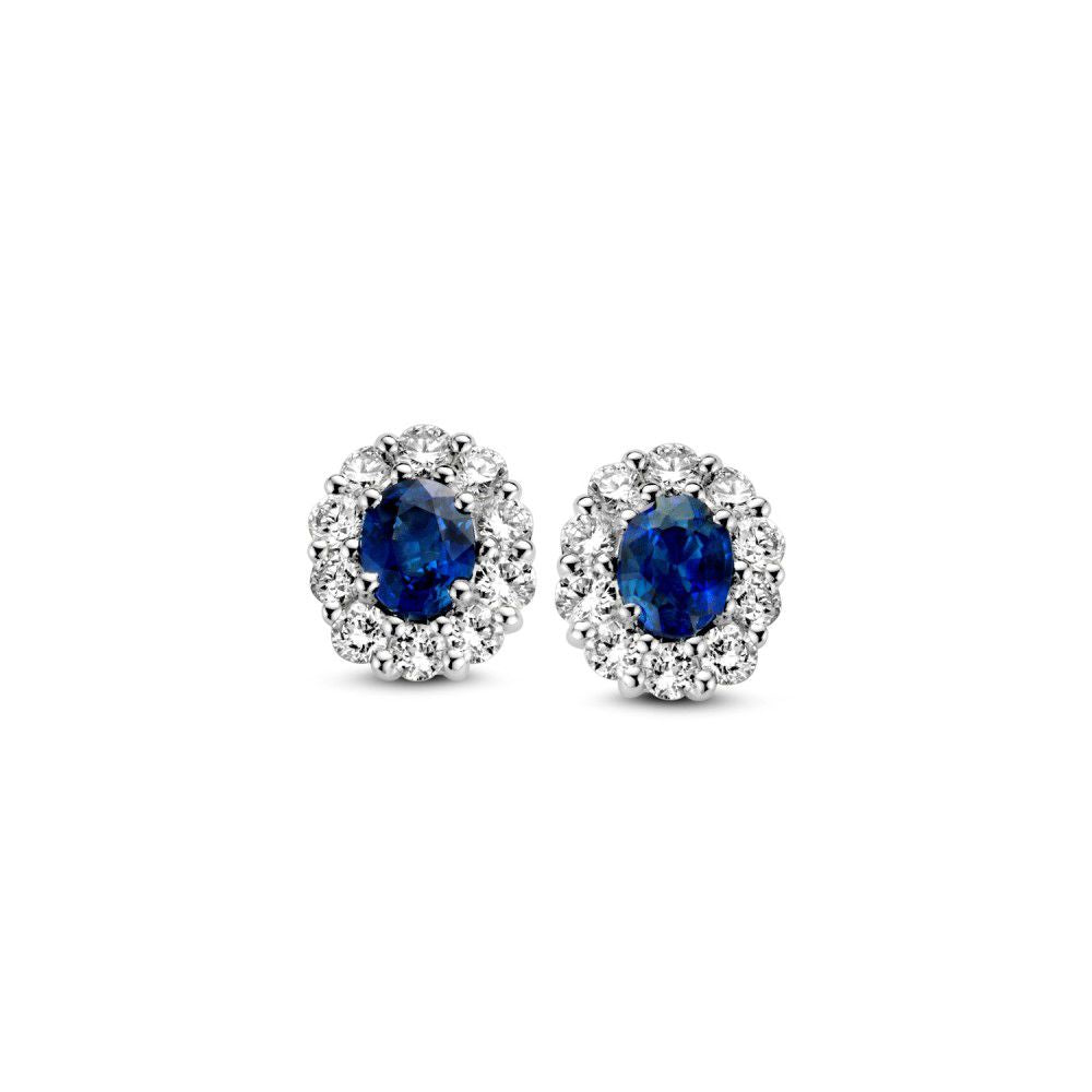 Orecchini in oro bianco 14K con zaffiri e diamanti, design a forma di fiore.
