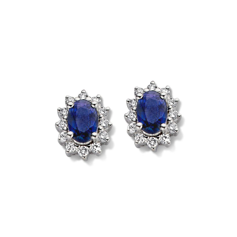 Orecchini in oro bianco con zaffiro ovale circondato da diamanti, design a fiore.