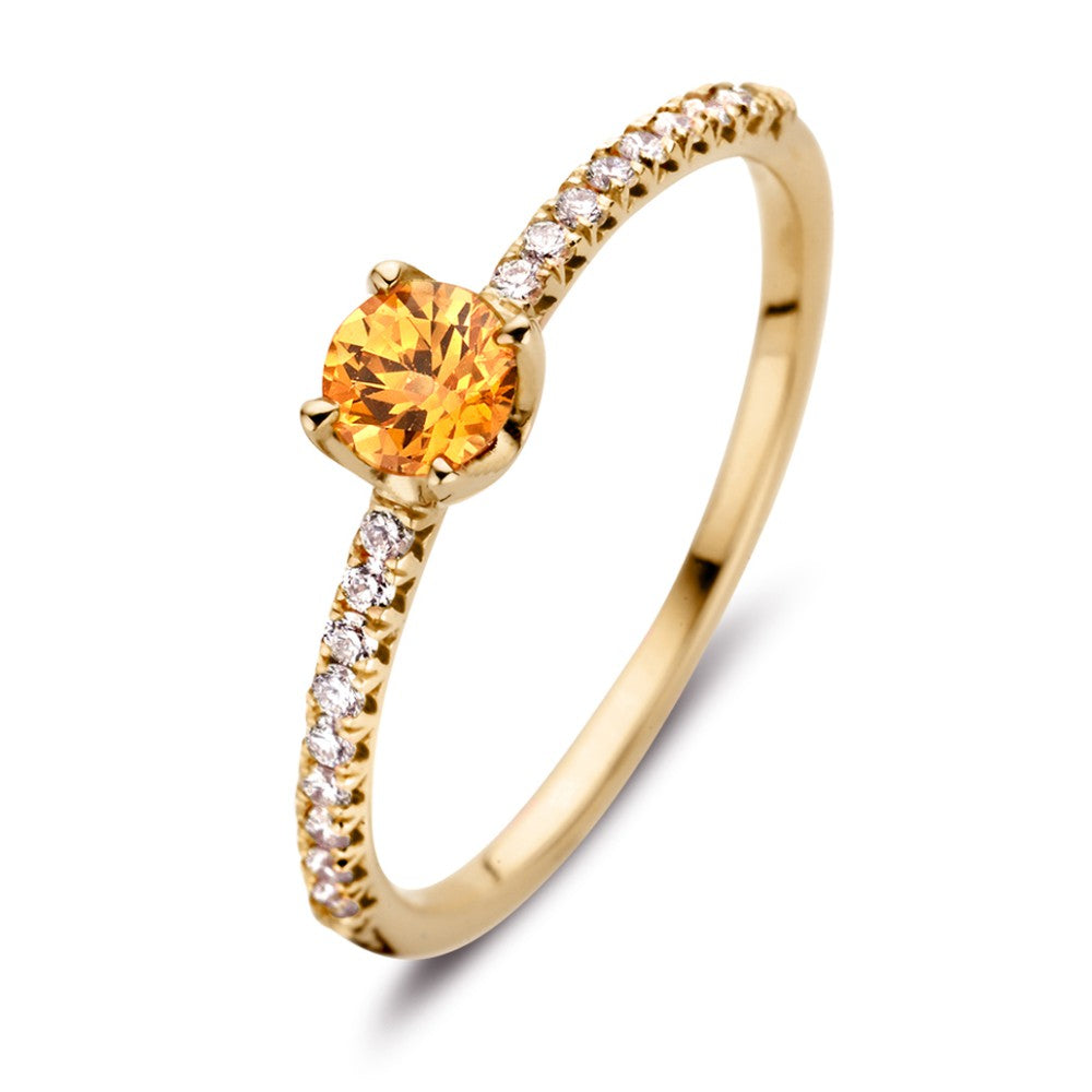 Anello in oro giallo 18kt con zaffiro arancione e diamanti da 0,15 ct.