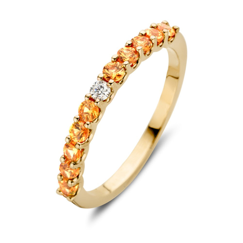 Geelgouden ring met oranje saffieren en een witte briljant, in een verfijnde setting.