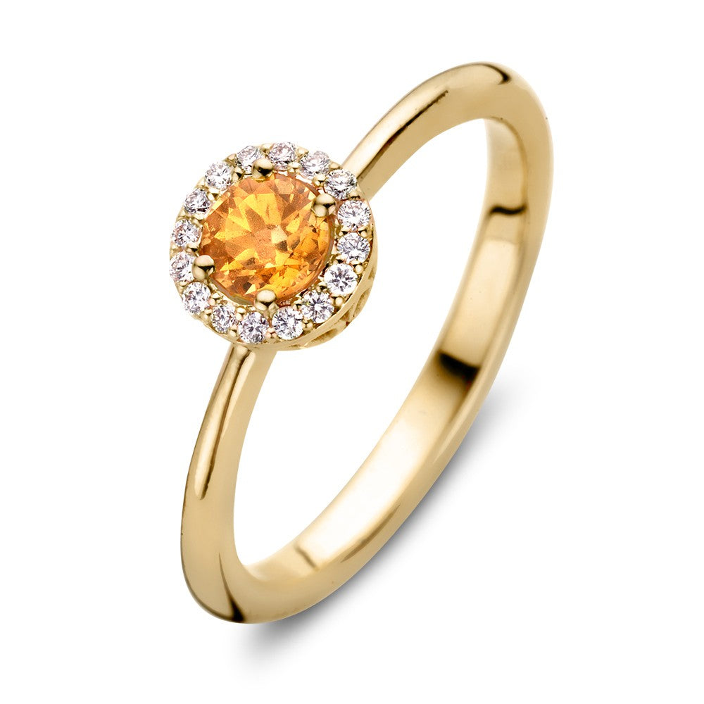Anello in oro giallo 18kt con zaffiro arancione e diamanti da 0,11ct.