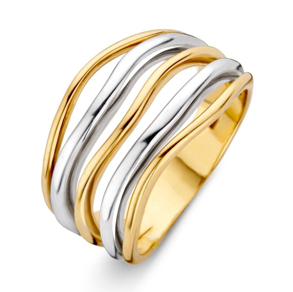 Anello in oro giallo e bianco a tre fasce ondulate.