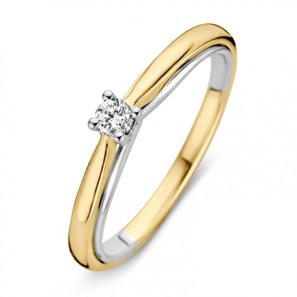 Anello bicolore in oro 14 carati con diamante taglio brillante.