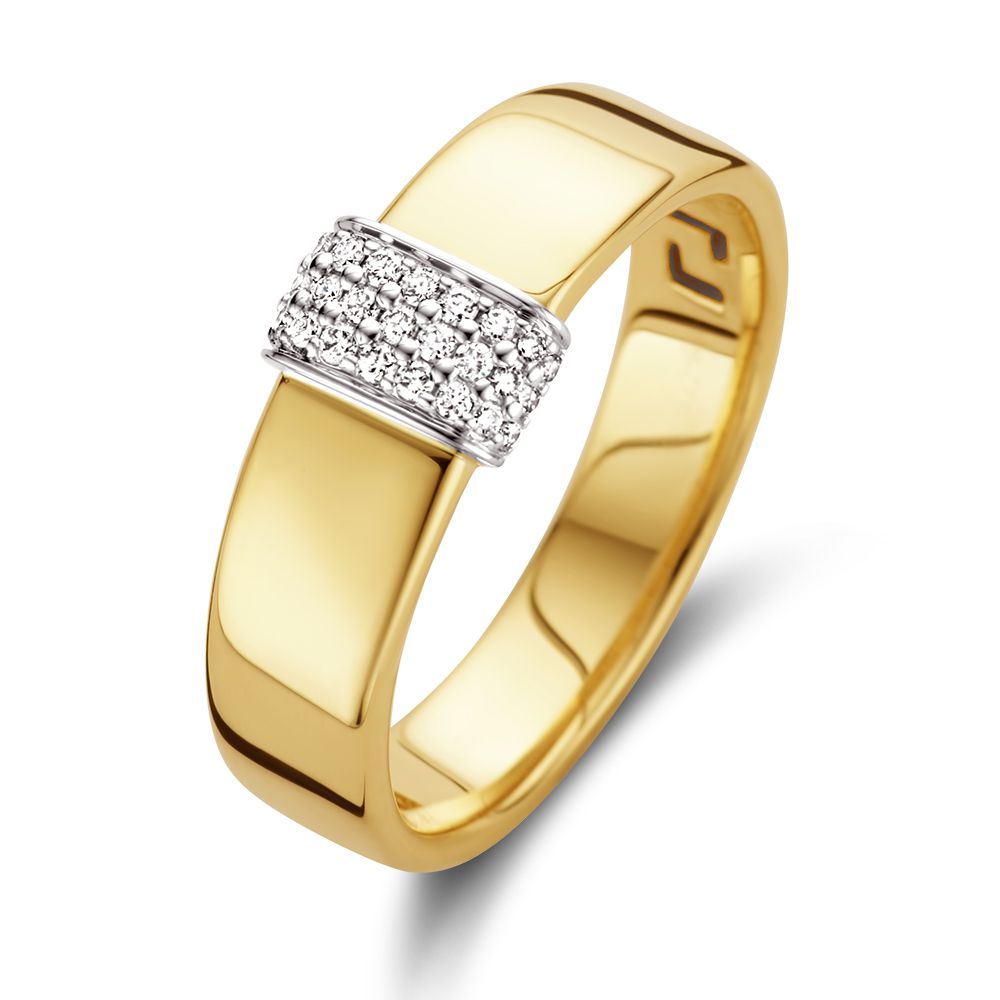 Anello in oro giallo 14 carati con un inserto di diamanti.