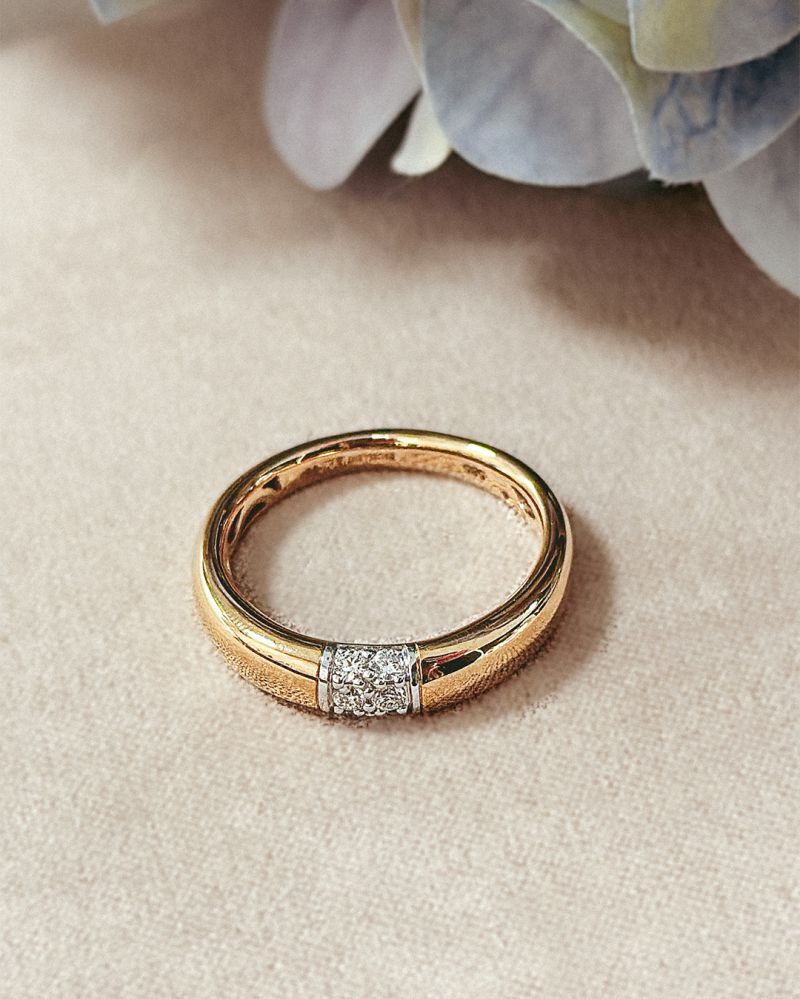 Anello bicolore con brillanti 0,16 ct.