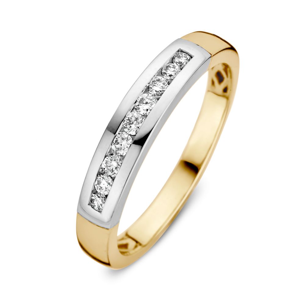 Anello bicolore in oro con brillante in incastonatura a binario – 0,20 carati.