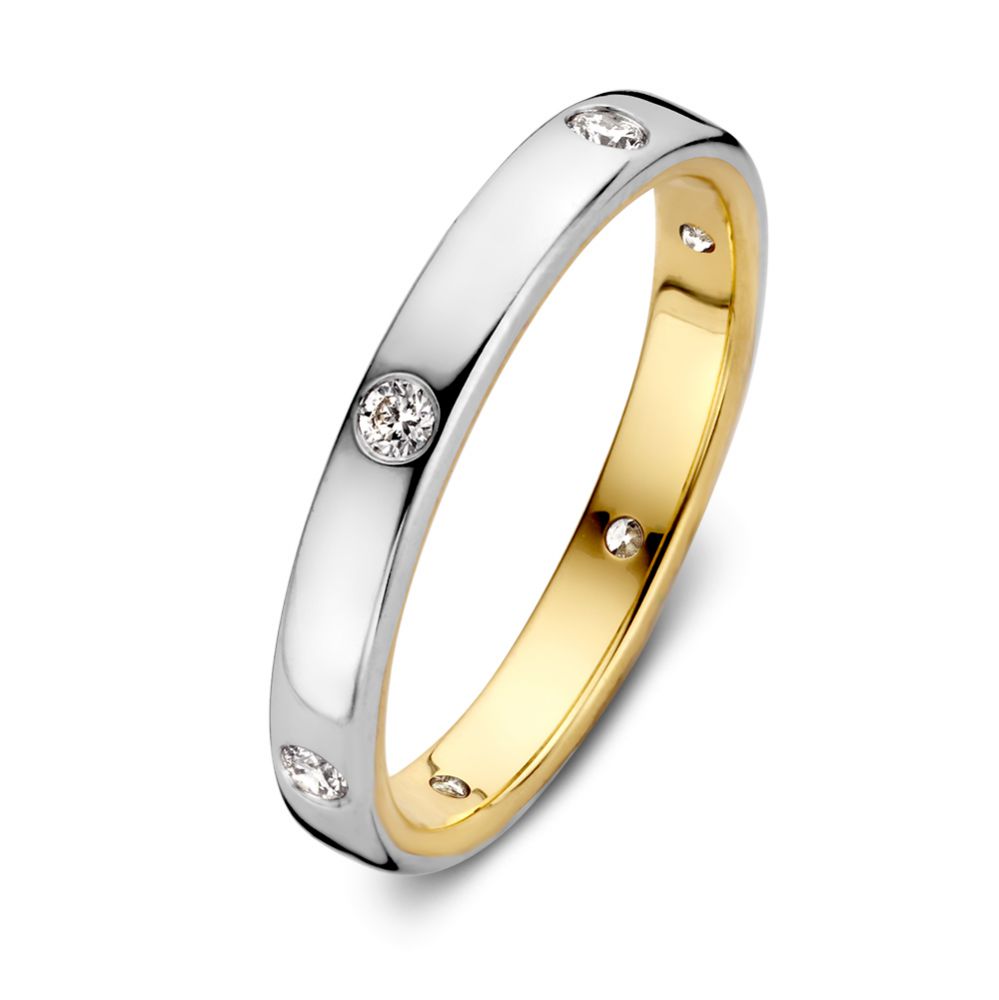 Anello bicolore in oro con diamanti – 0,20 carati.