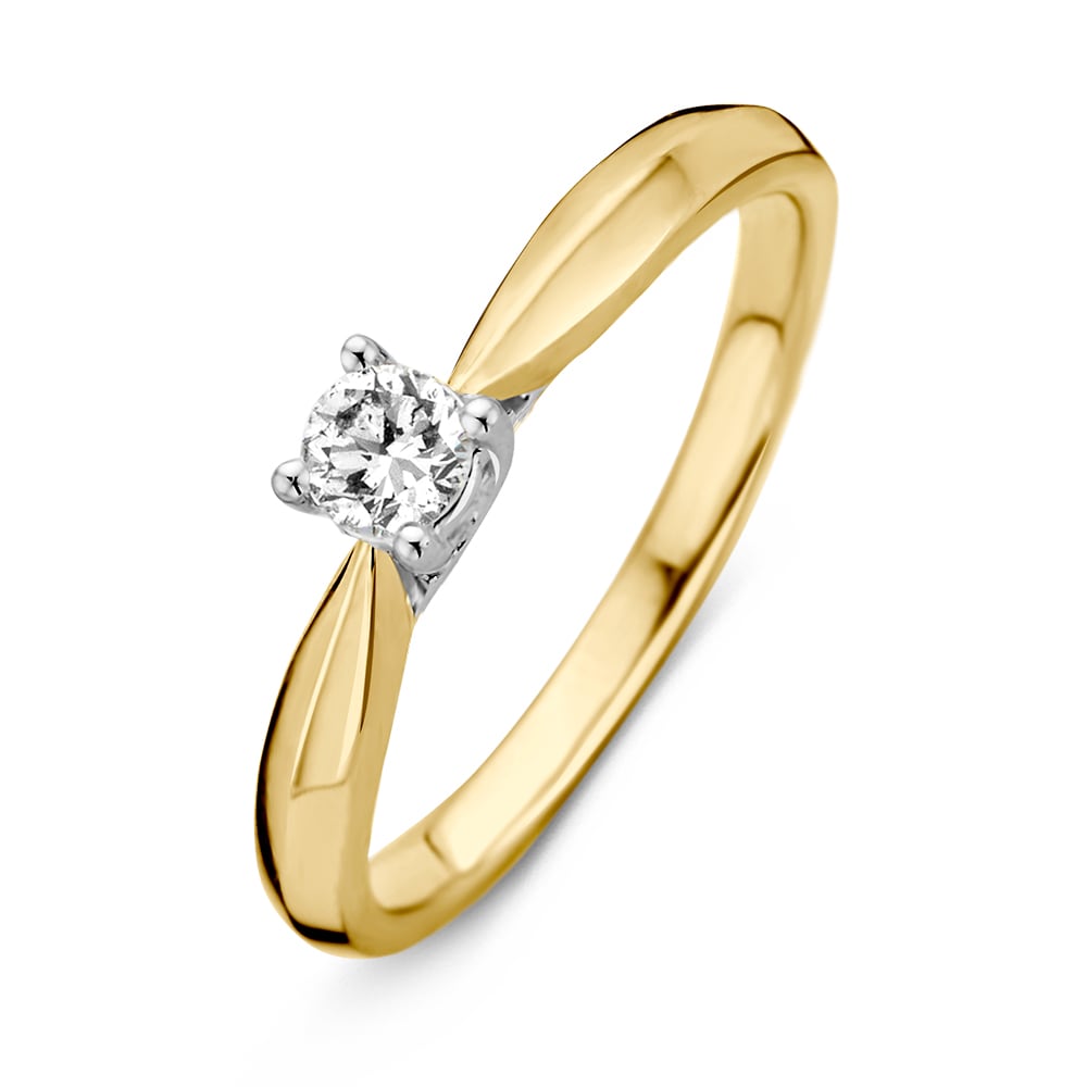 Anello bicolore in oro giallo e bianco con diamante di 0,24 ct.