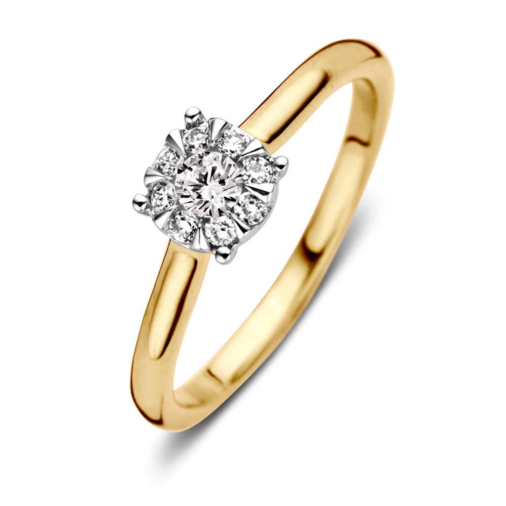 Anello in oro giallo bicolore con diamante da 0,25 carati, design classico e brillante.