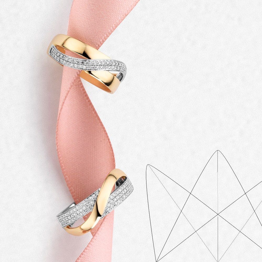 Raffinato Anello Bicolore con Diamante – 0.26 Carati