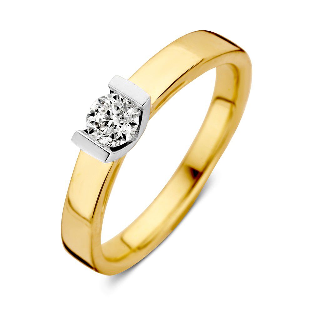 Anello solitario bicolore in oro bianco e giallo con pietra centrale taglio brillante di 0,30 crt.