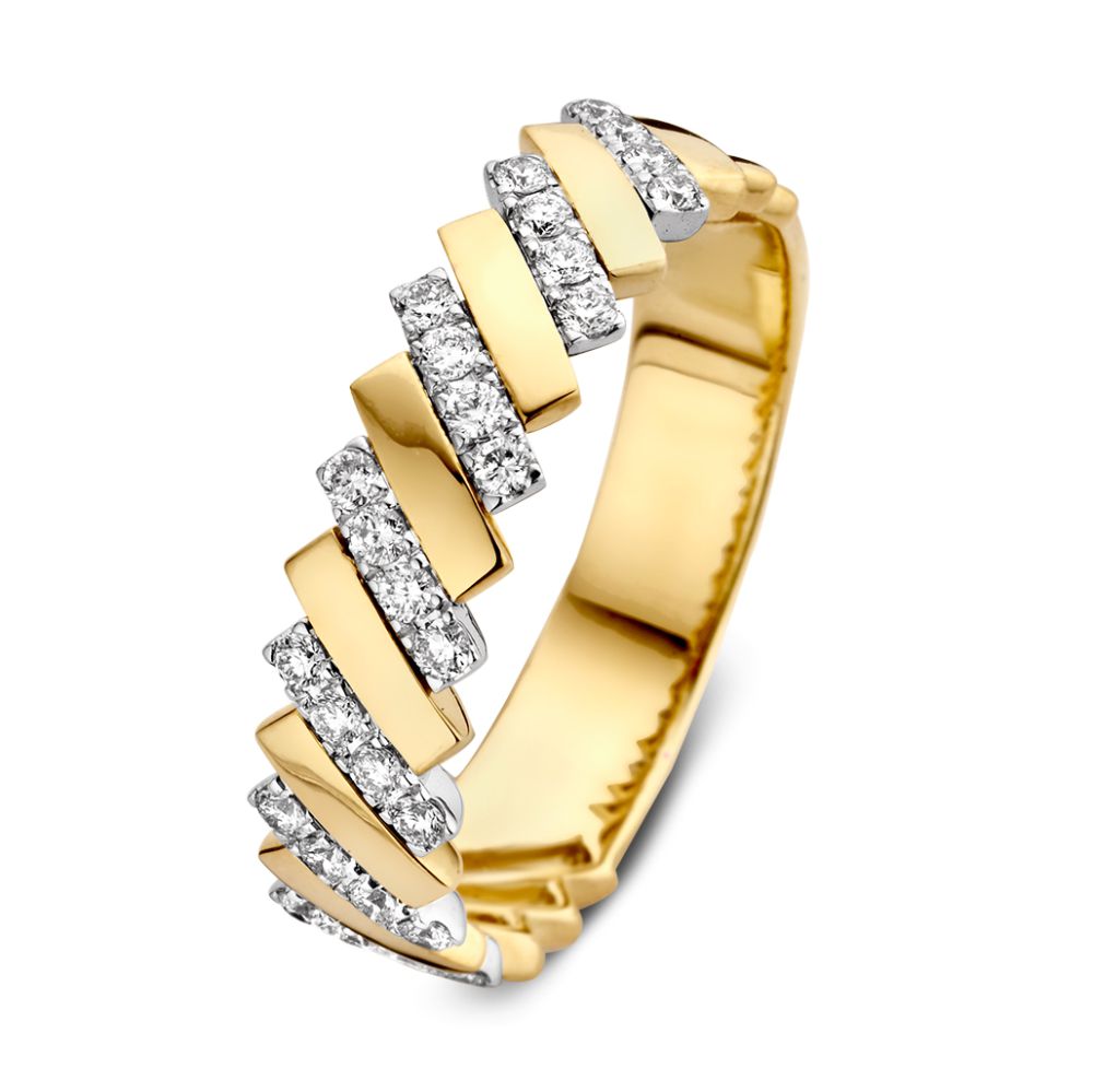 Anello bicolore in oro giallo e bianco con diamanti da 0,30 crt, design ondulato.
