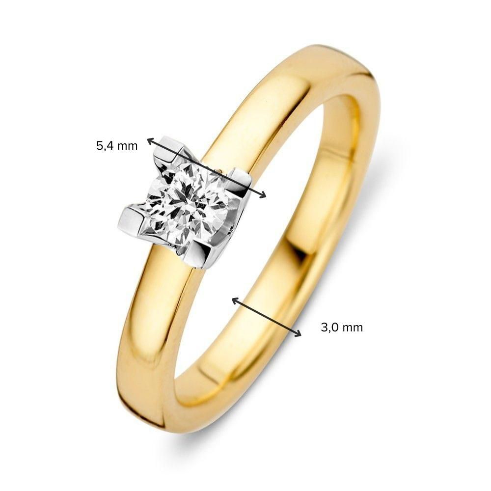icolor Anello Solitario Slanciato in Oro Giallo-Bianco con Diamante Brillante 0,30 crt e Incastonatura a Quattro Griffe 0.30 crt.