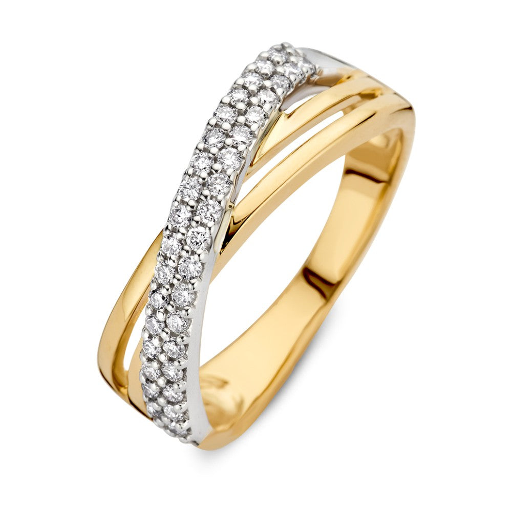 Anello crossover bicolore in oro bianco e giallo con diamanti da 0,30 crt.