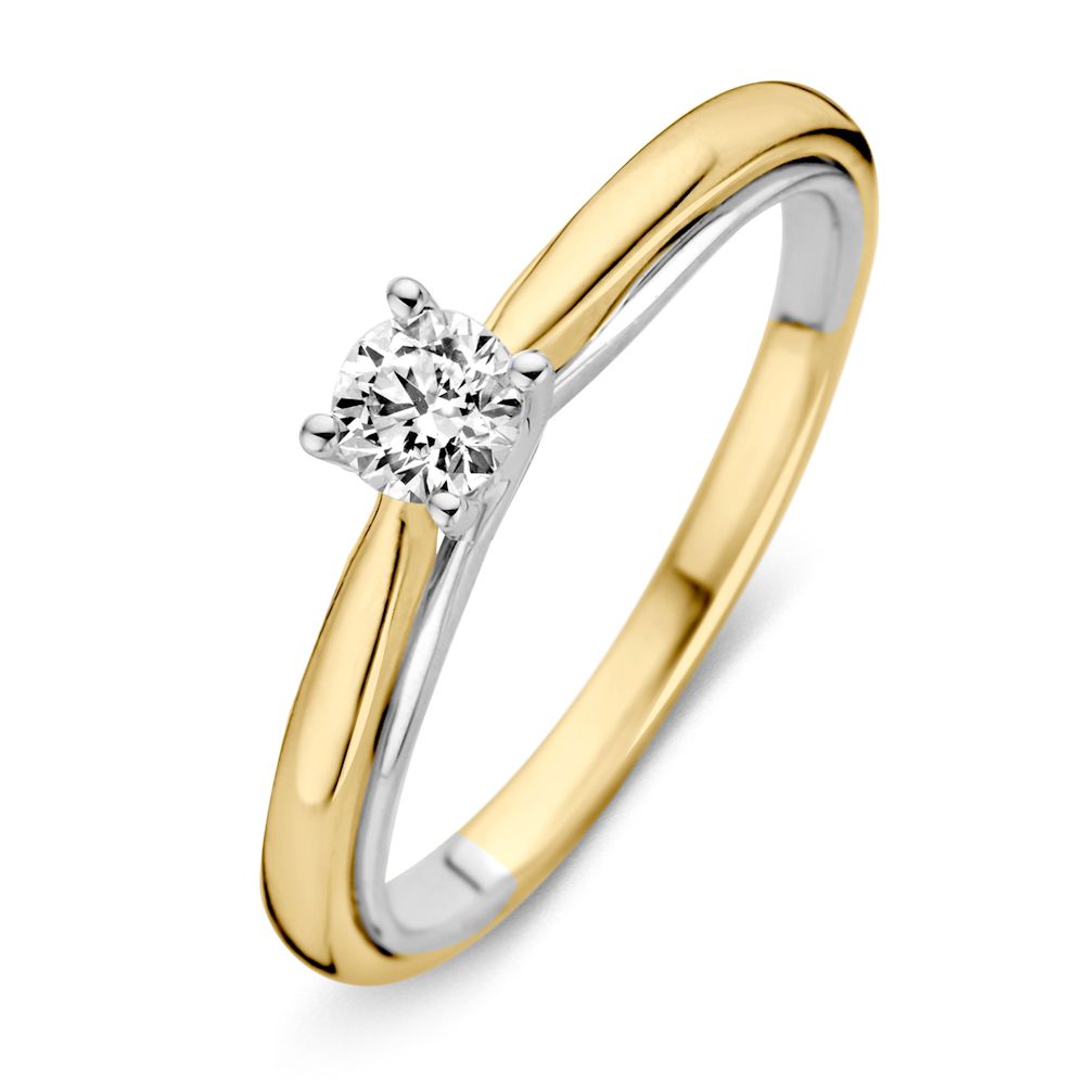 Anello bicolore in oro giallo e bianco con diamante brillante da 0,31 crt.
